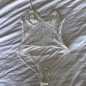 White lace body suit